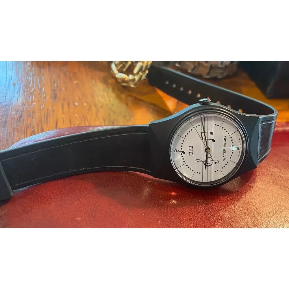 Women's 33mm Q&Q by Citizen Watch, Black Poly Case and Band, Musical Notes Face